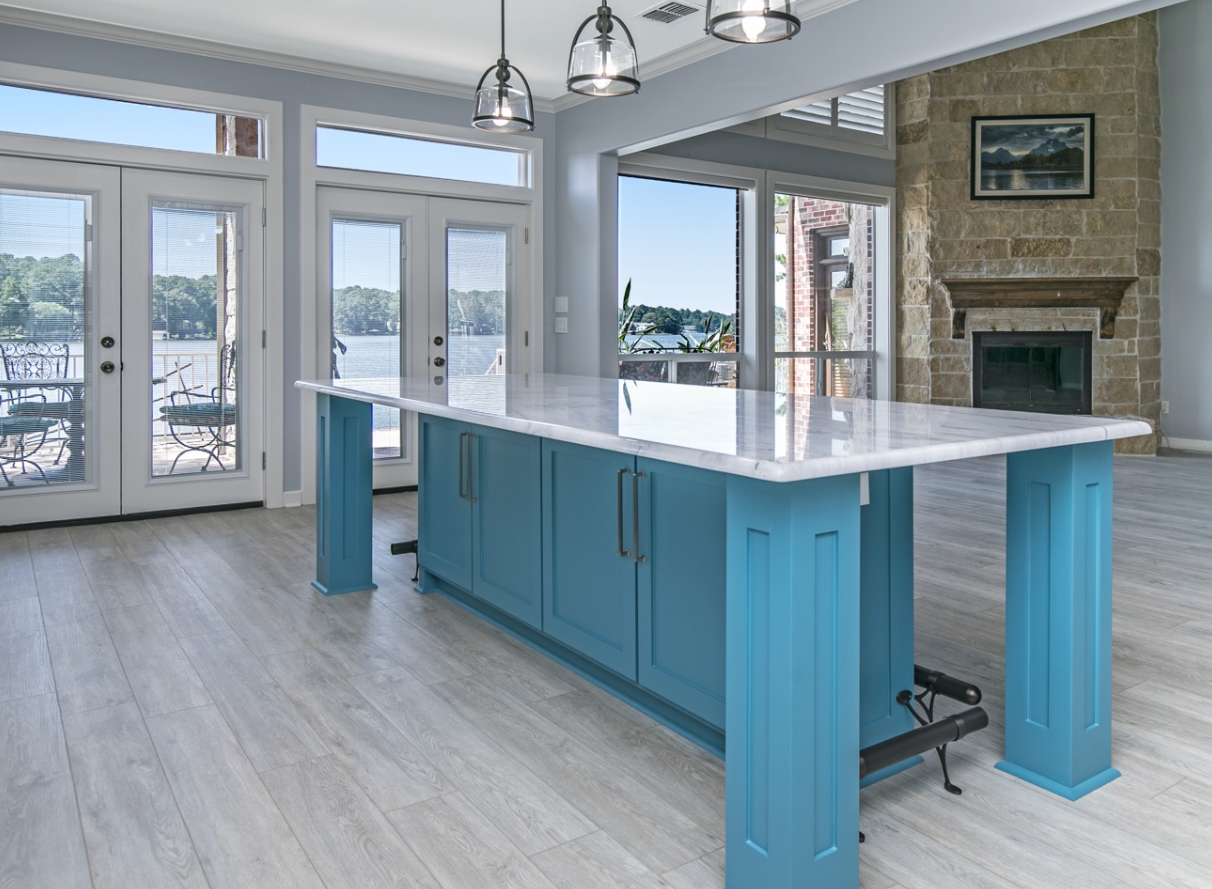 There is a large island in the middle of the room.