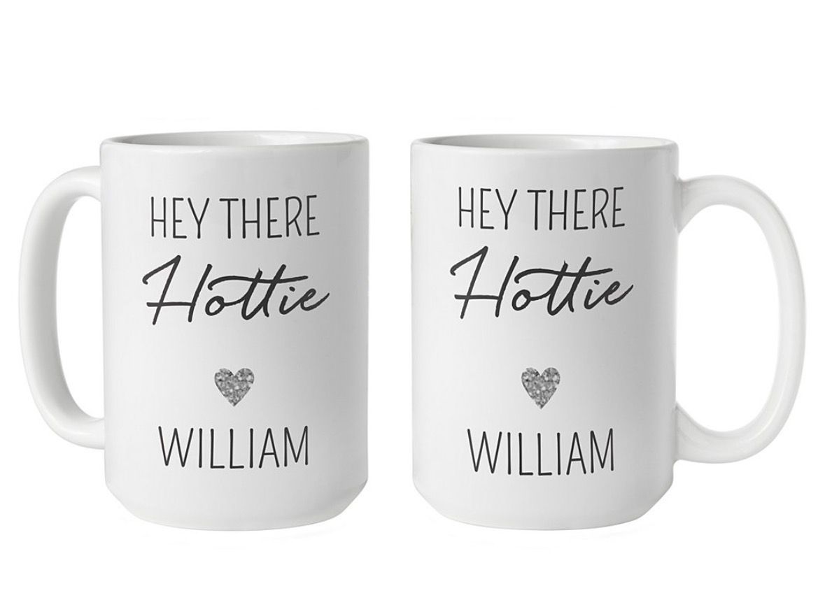 Two white mugs with text: 