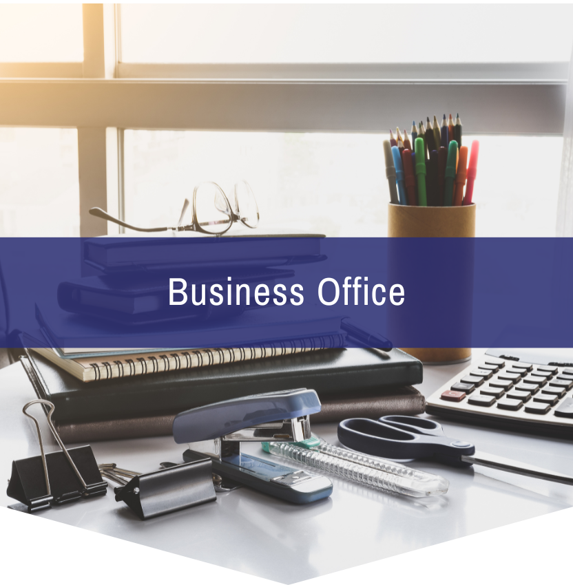 A business office with a calculator and a stapler