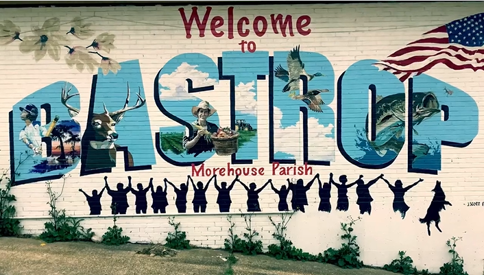 A mural on a wall that says welcome to castle