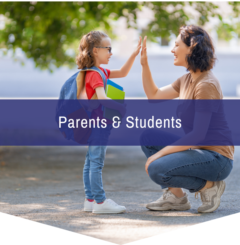A woman gives a high five to a little girl with a backpack