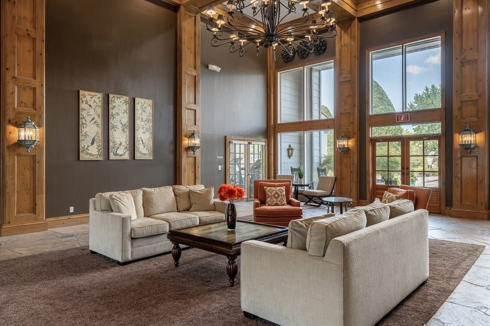 Clubhouse filled with furniture, a chandelier, and luxury interiors at Marquis at Silverton in Cary, NC.