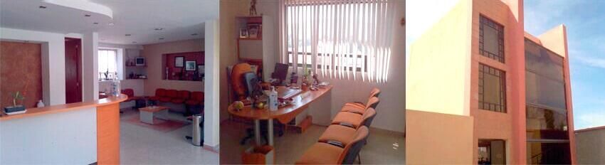 Una toma interior de tres secciones, posiblemente un consultorio de dentista con colores naranja y blanco.