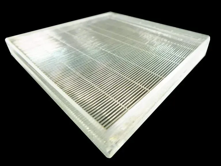 A clear plastic tray on a black background
