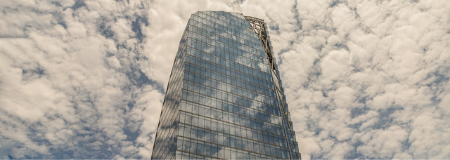 Picture of a glass building. Picture of a glass building.