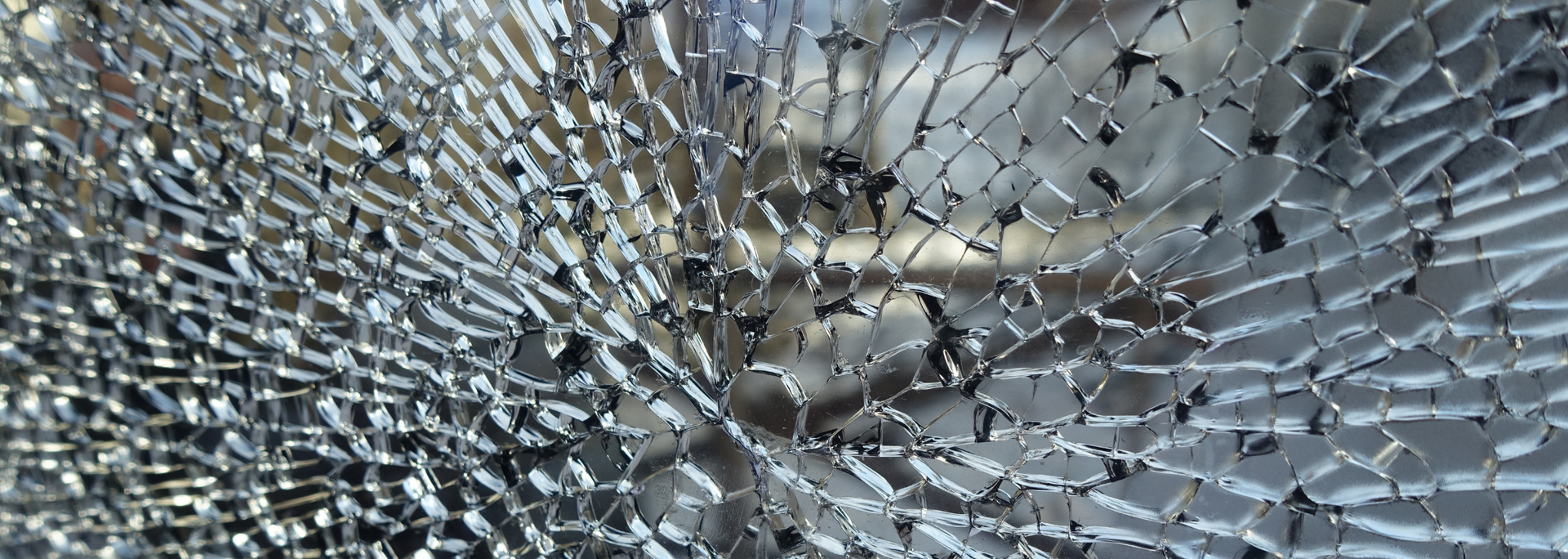 Picture of broken toughened glass pieces.