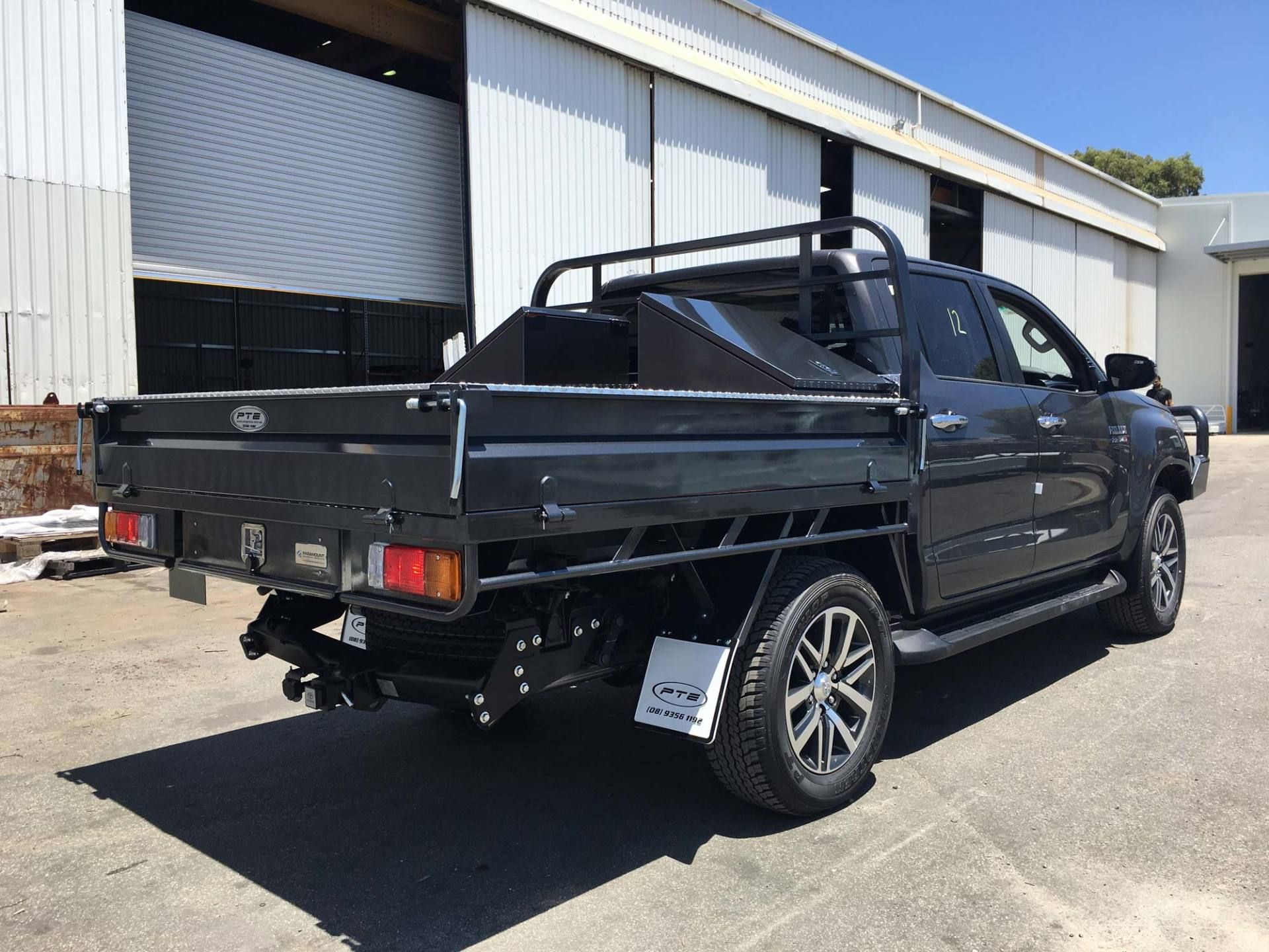 A Black Truck with A Ptb Logo on The Side — Welshpool, WA — PTE Group Pty Ltd
