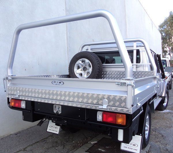 A Beautiful Silver Truck with A Spare Tire on The Back of It — Welshpool, WA — PTE Group Pty Ltd