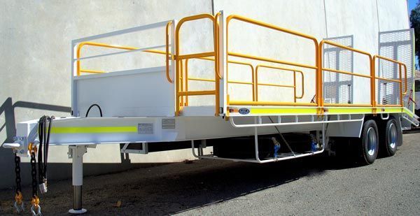 A White Trailer with A Yellow Railing and A Sign that Says Cargo on It — Welshpool, WA — PTE Group Pty Ltd
