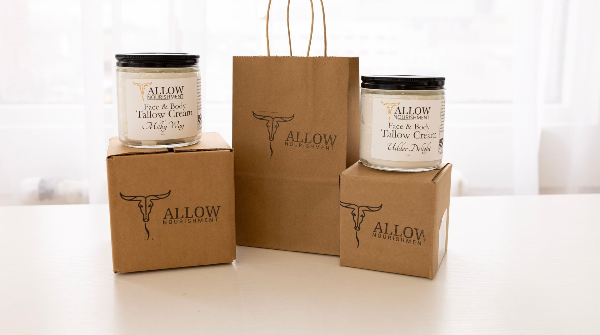 two jars of allow nourishment are sitting on a table