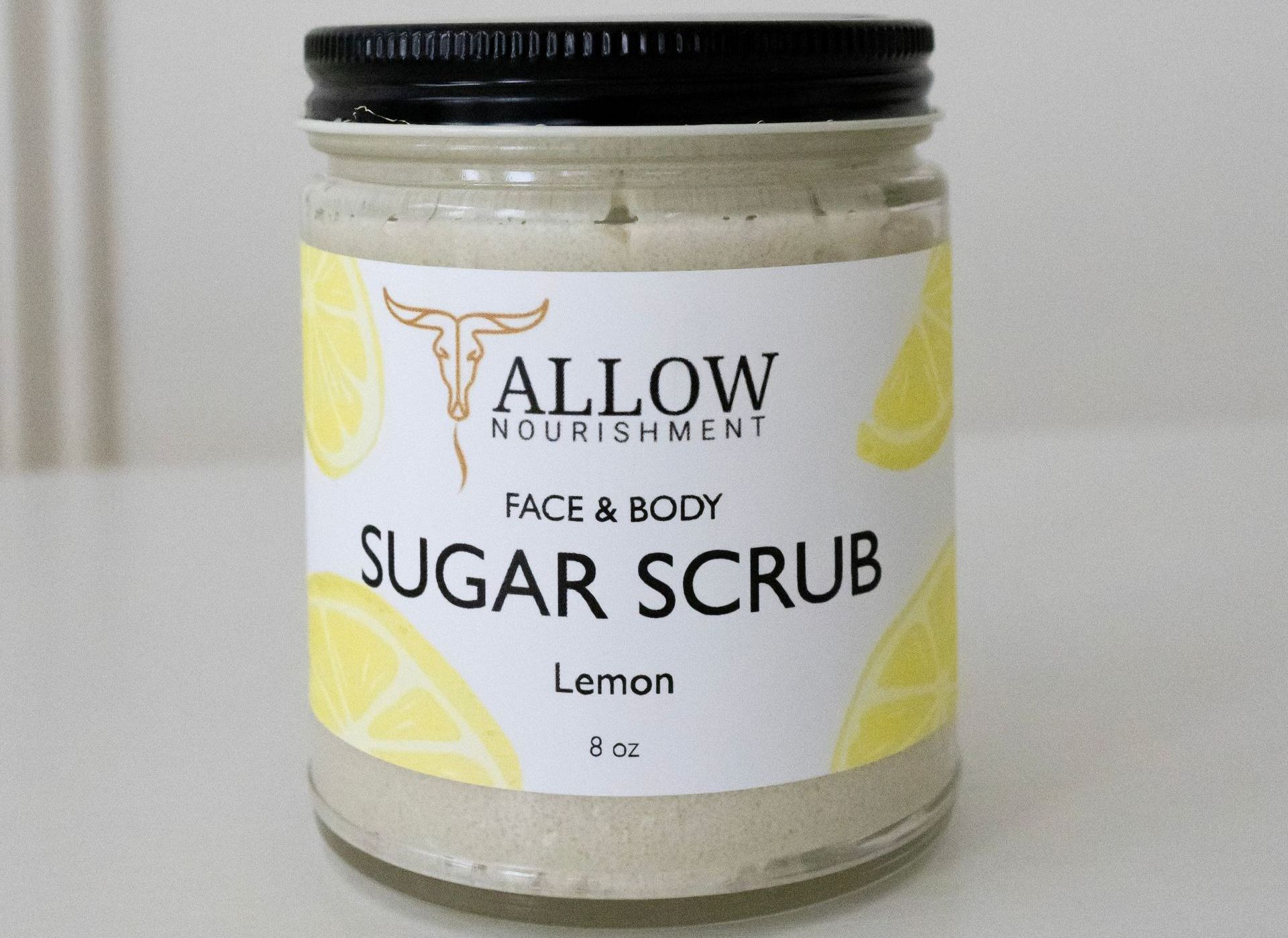 A jar of allow nourishment lemon sugar scrub