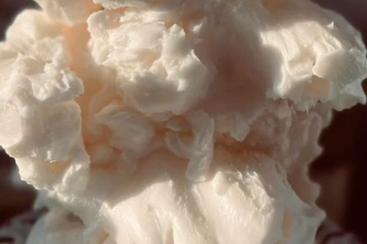 Allow Nourishment - A close-up of tallow on a table.