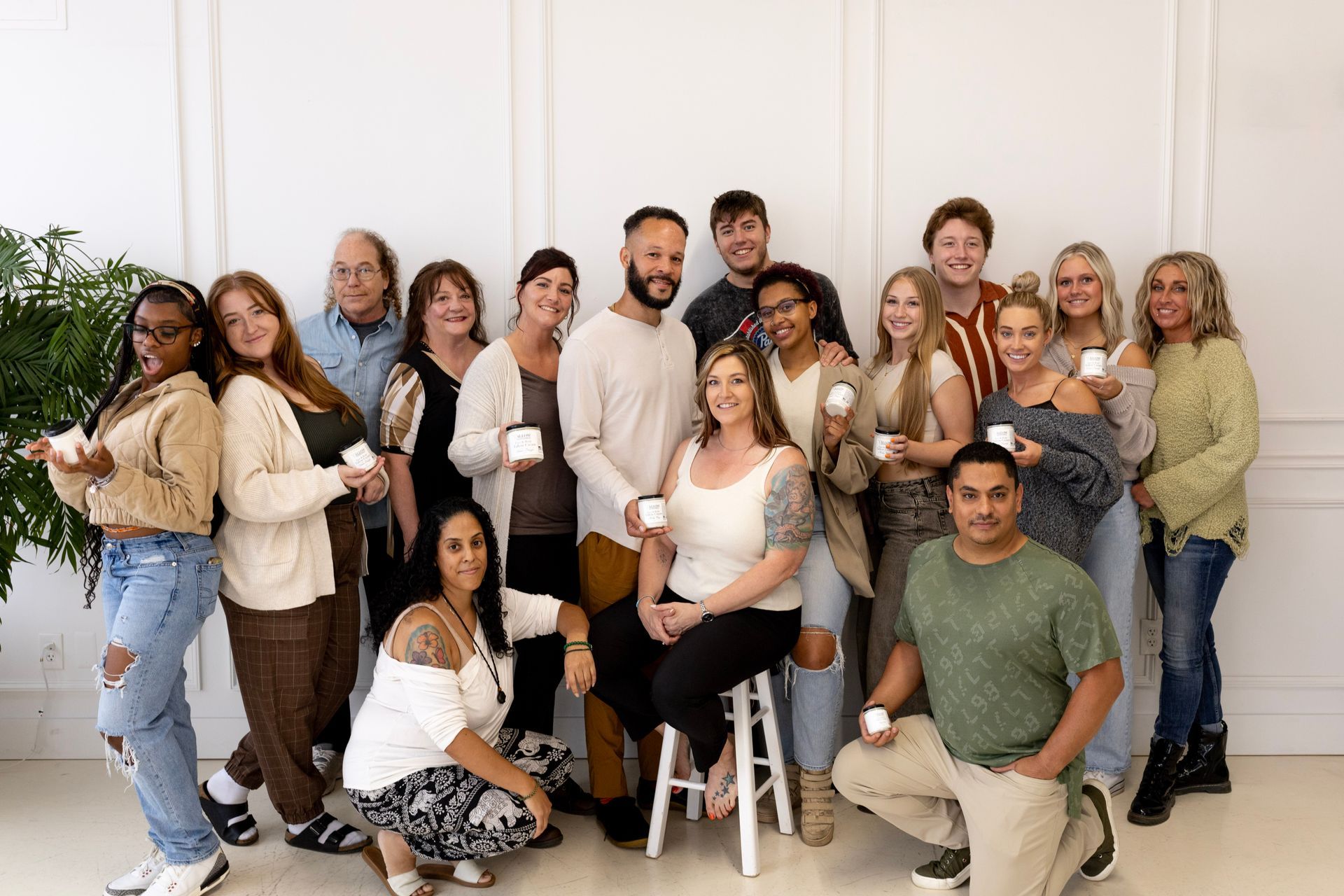 Allow Nourishment team members posing for a picture holding Beef Tallow Face & Body Creams