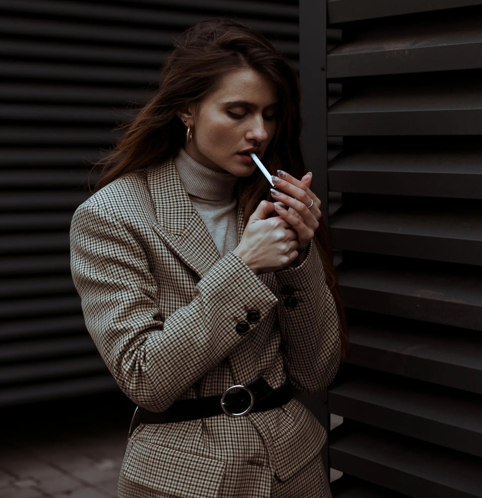 A woman is smoking.