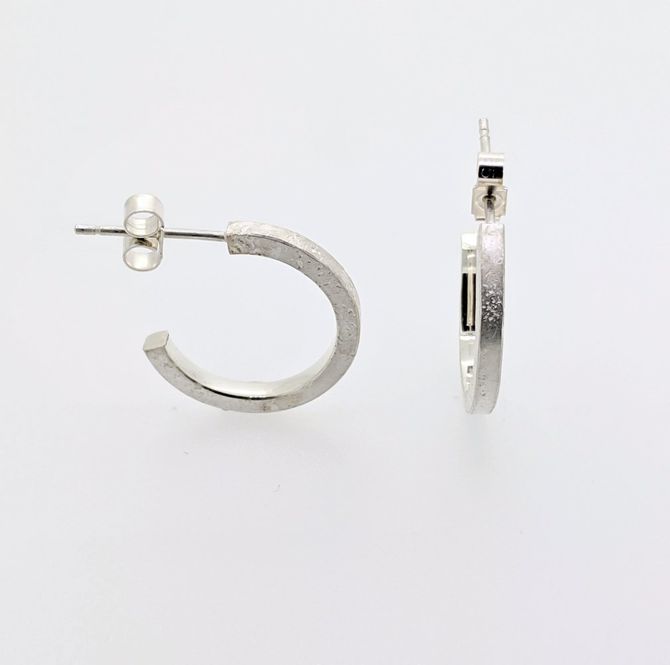 Small sculptural sterling silver earrings