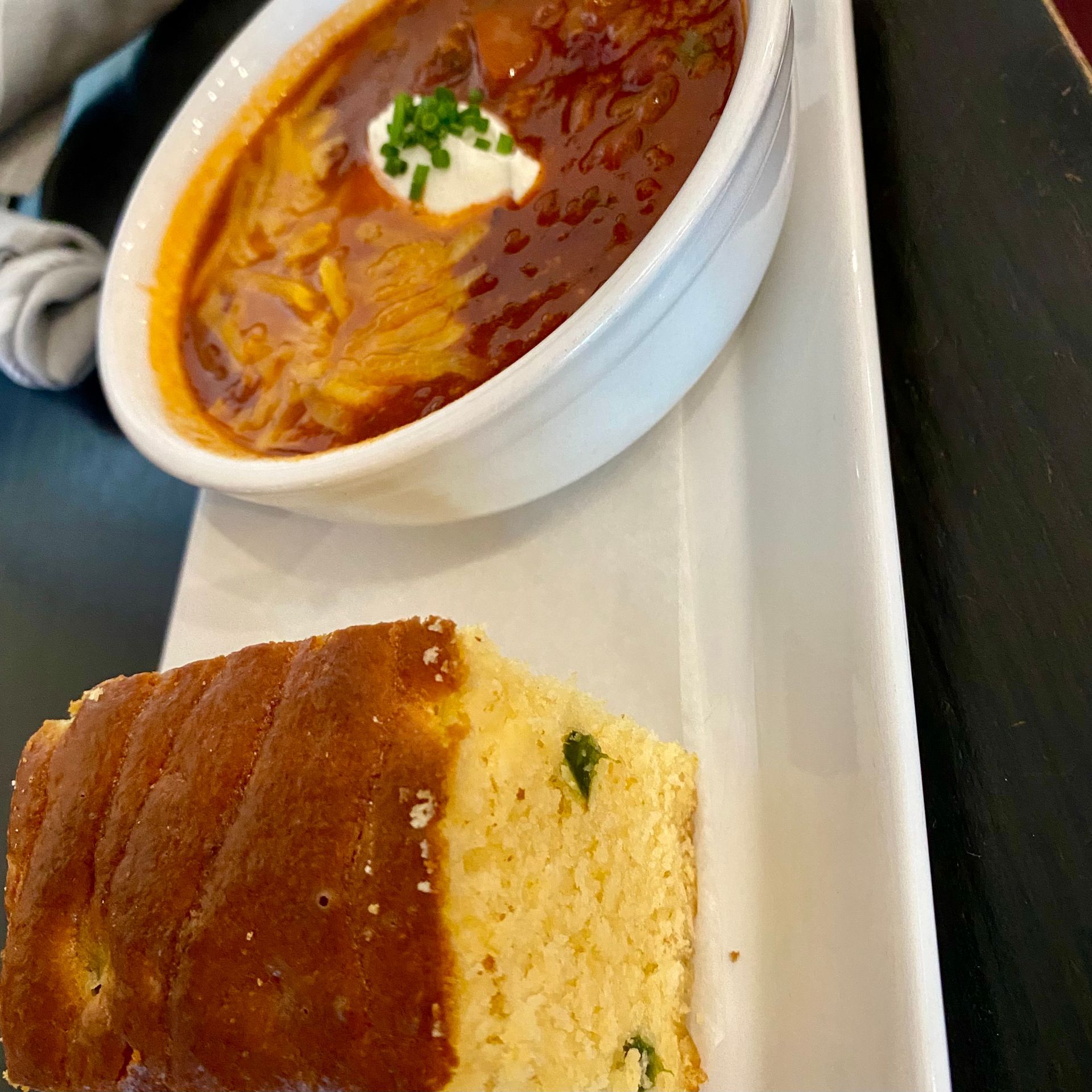 HEARTY BEEF AND BEANS, AGED CHEDDAR, SOUR CREAM, JALAPENO MAPLE CORN BREAD