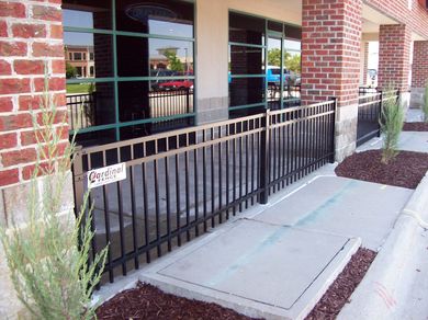 Steel courtyard/patio commercial ornamental fence installed in Omaha by Cardinal Fence Omaha