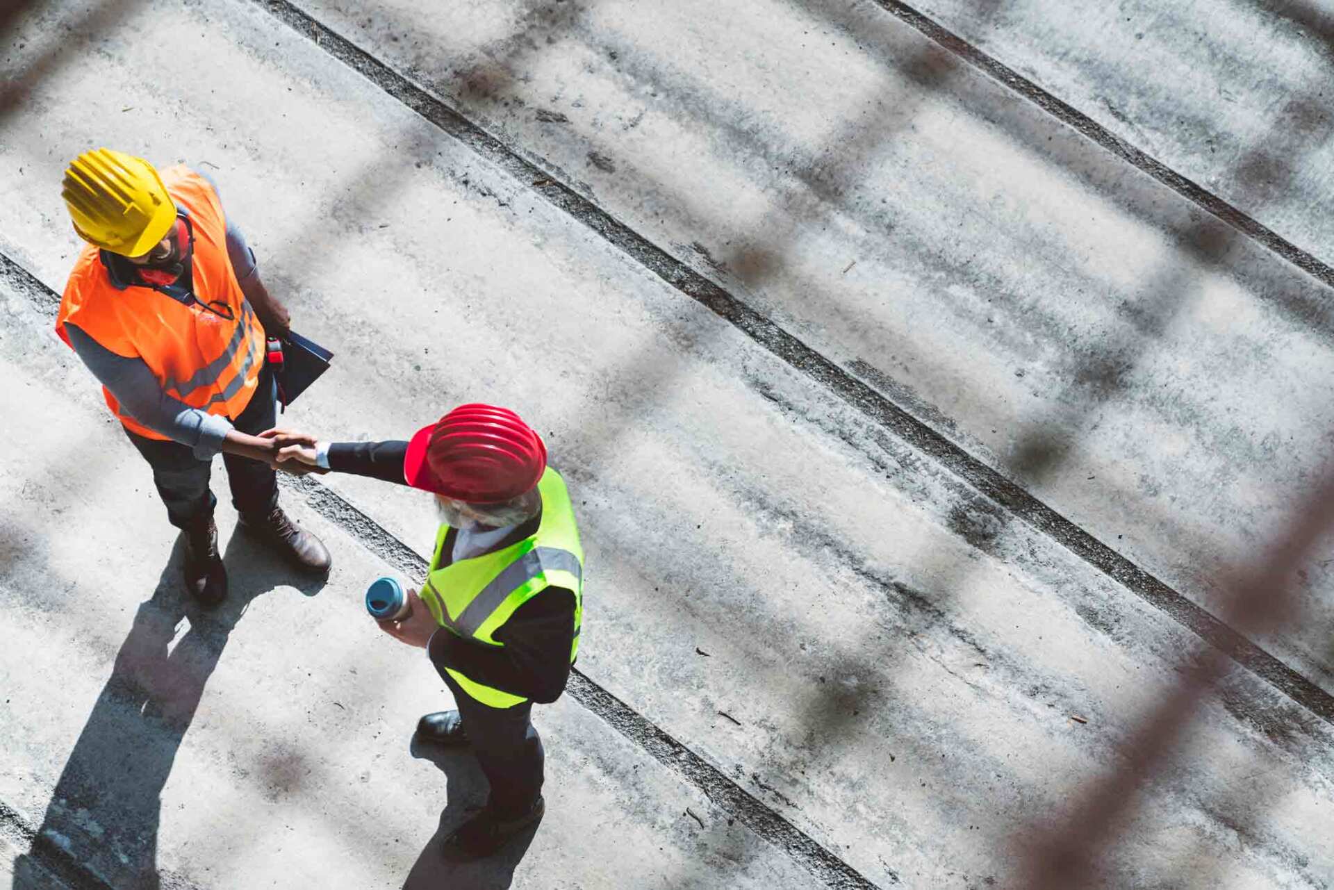 Top View Of Workers Shaking Hands — Milwaukee, WI — One Source Staffing, Inc.