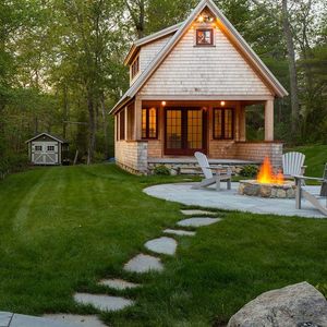 A cottage in the middle of the forest.