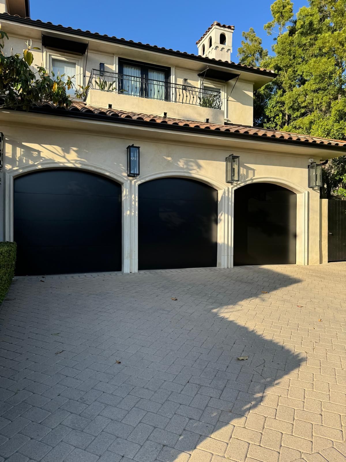 A storage unit filled with boxes and a bicycle.