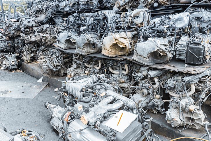 a pile of junk is sitting on top of each other on the ground .