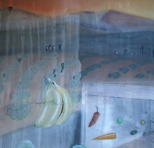 A water damaged mural depicting a landscape and floating fruits