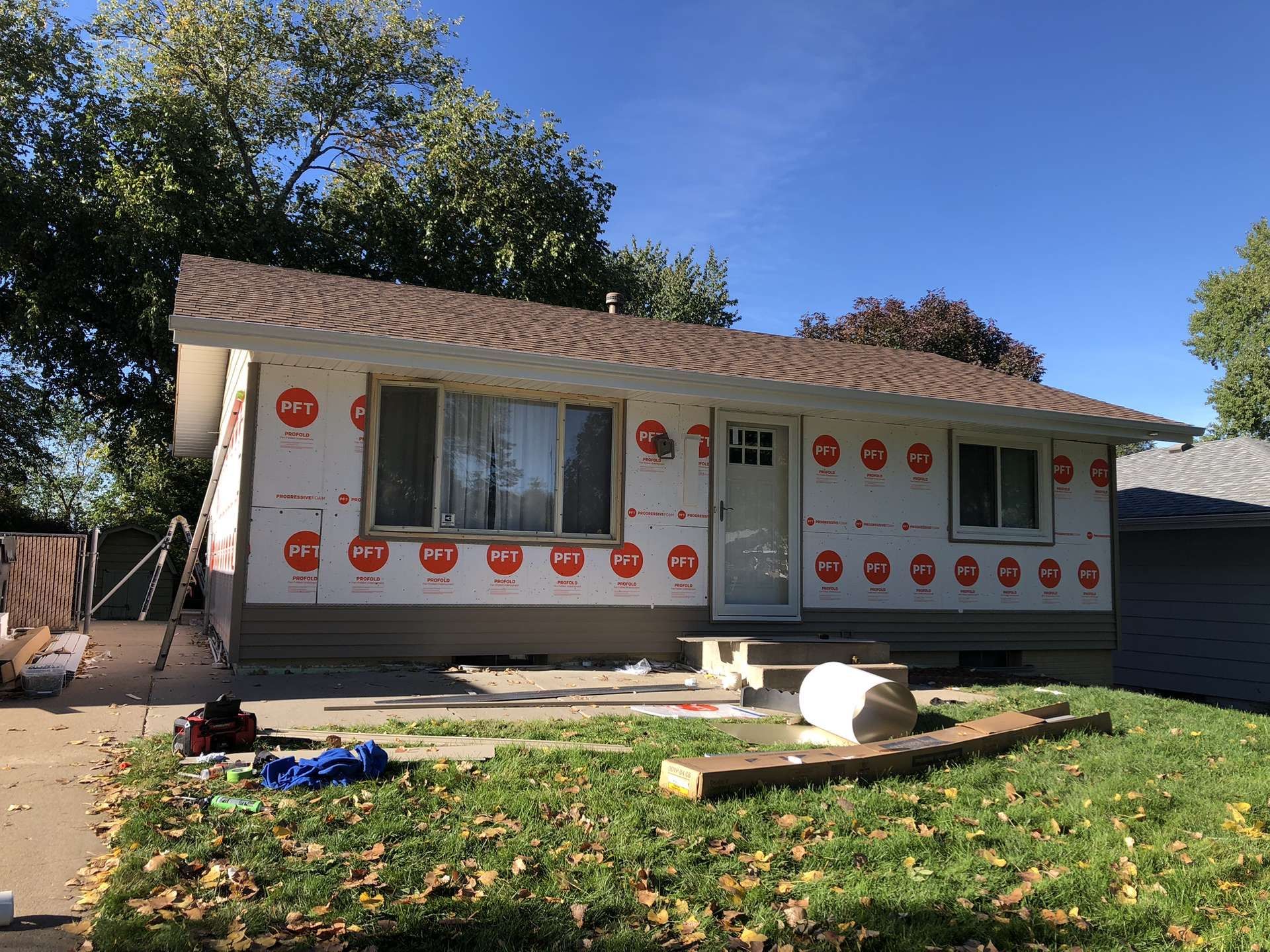 A house with a lot of insulation on the side of it.