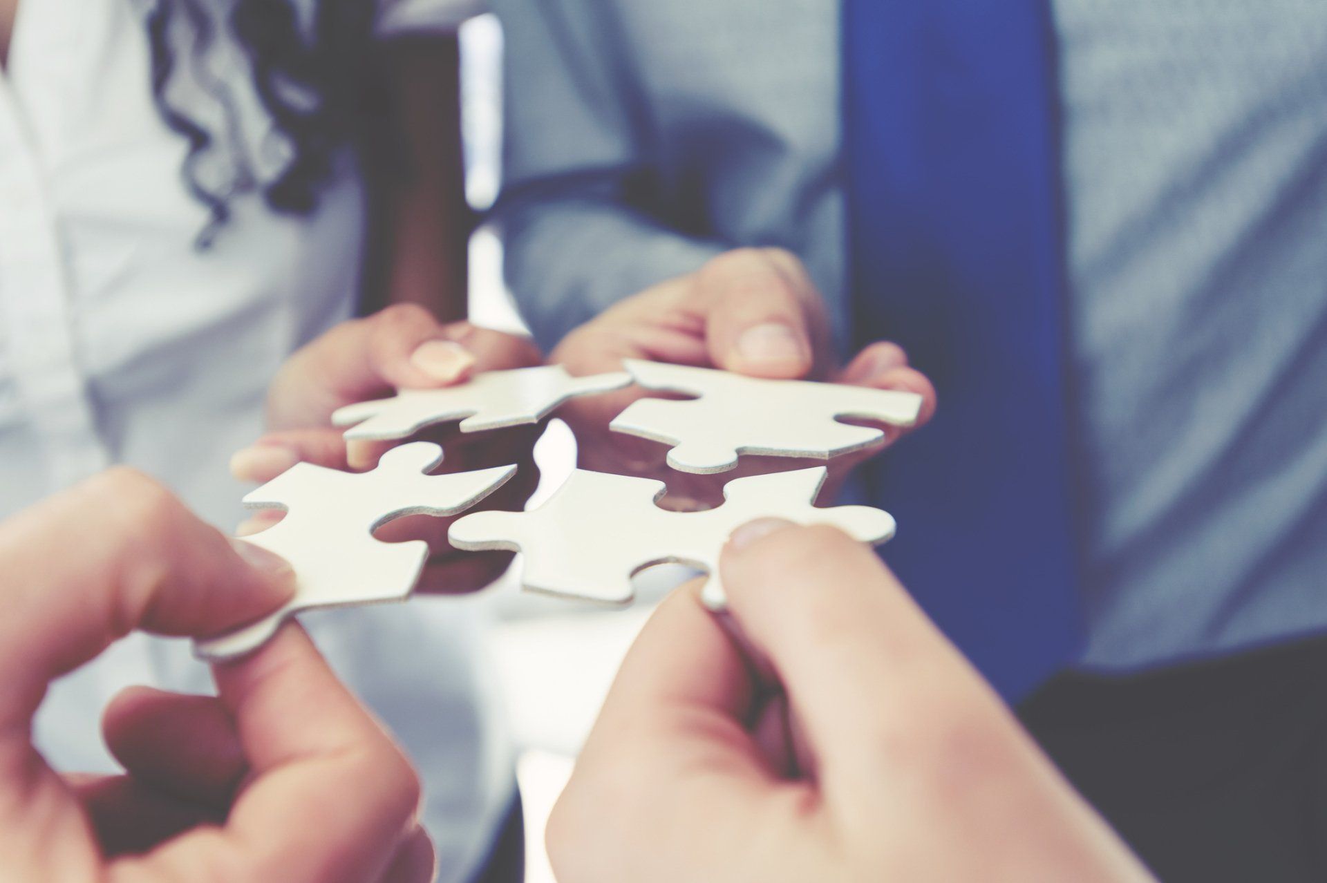 Team Holding a Puzzle — Melbourne, VIC — Robinson St Accounting