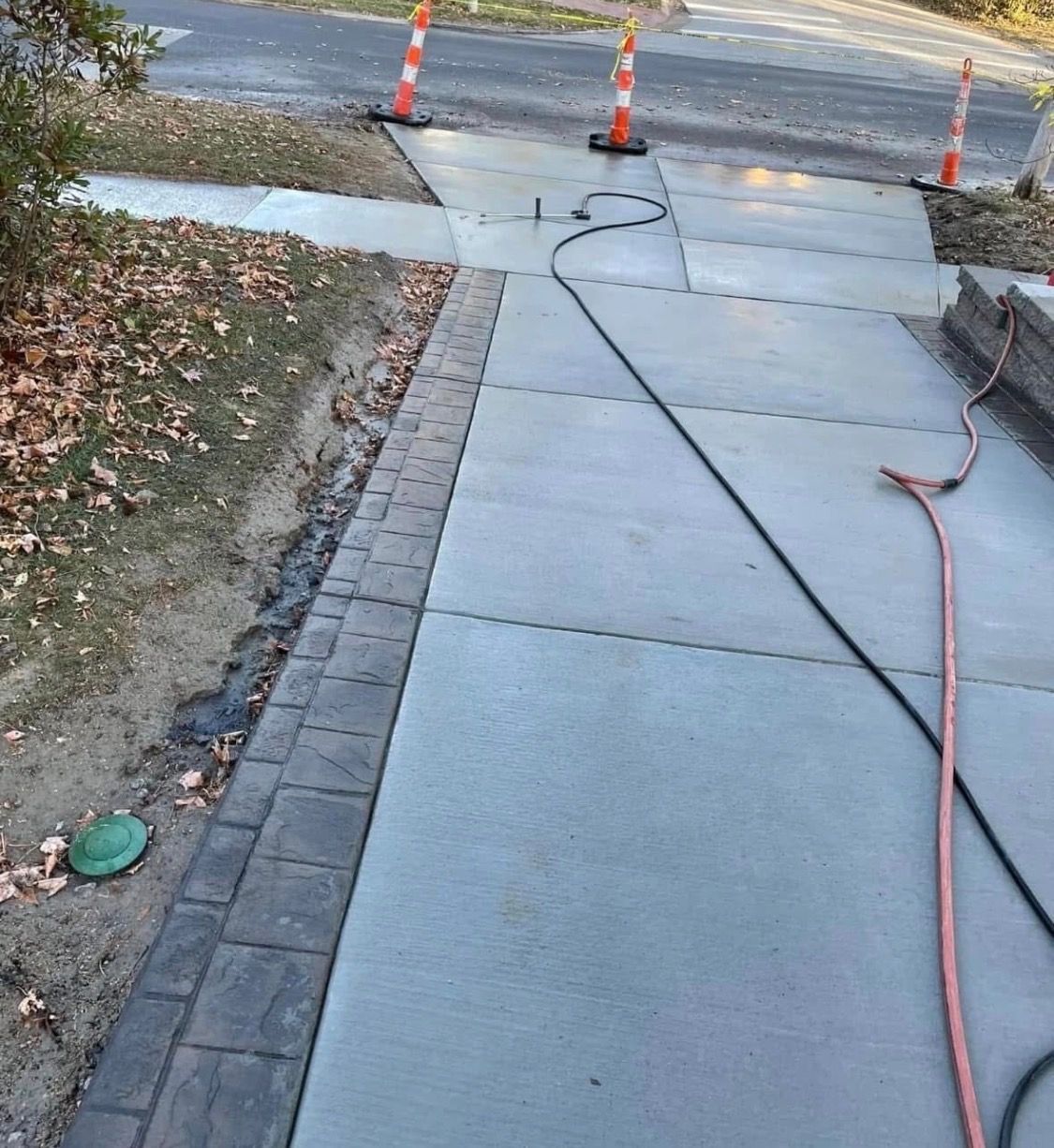 Broom with Border Driveway — Town and Country, MO — Hoffman Concrete LLC