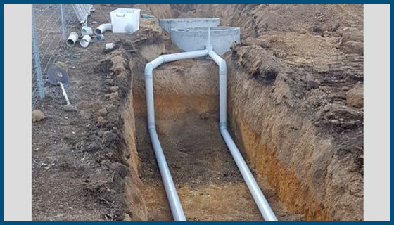 A close up of a white limestone tile floor.