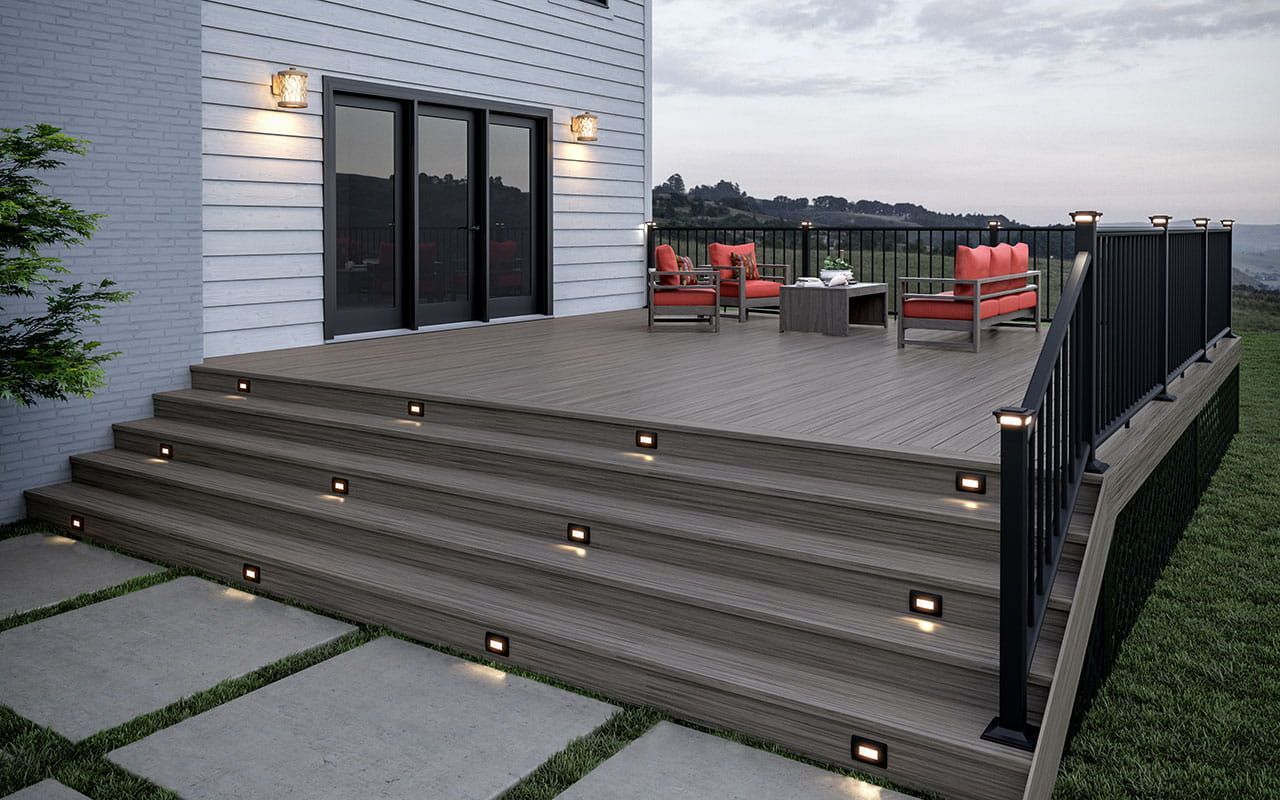 A large deck with stairs leading up to it