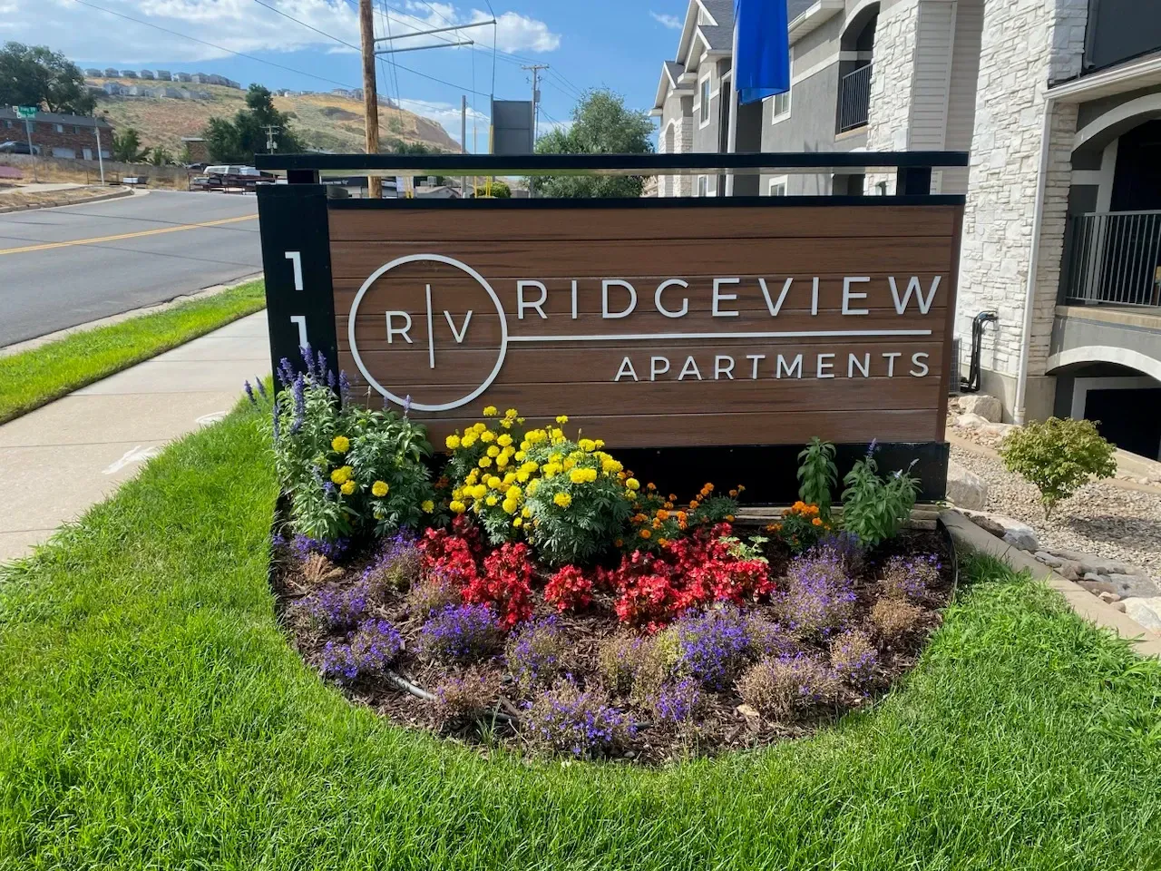 Ridgeview Apartments monument sign with landscaping