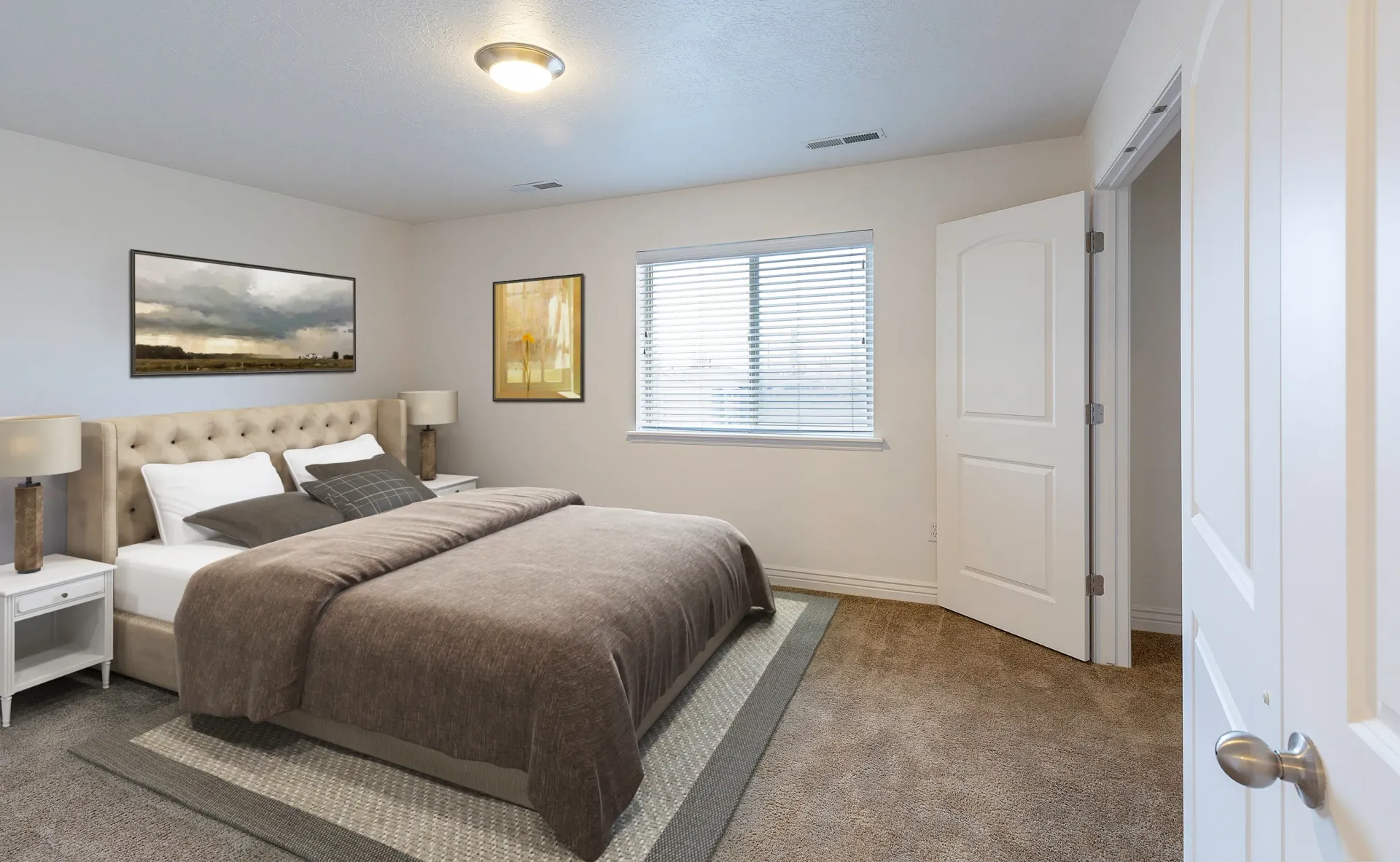 Bedroom with a king-size bed, nightstands, and a closet.