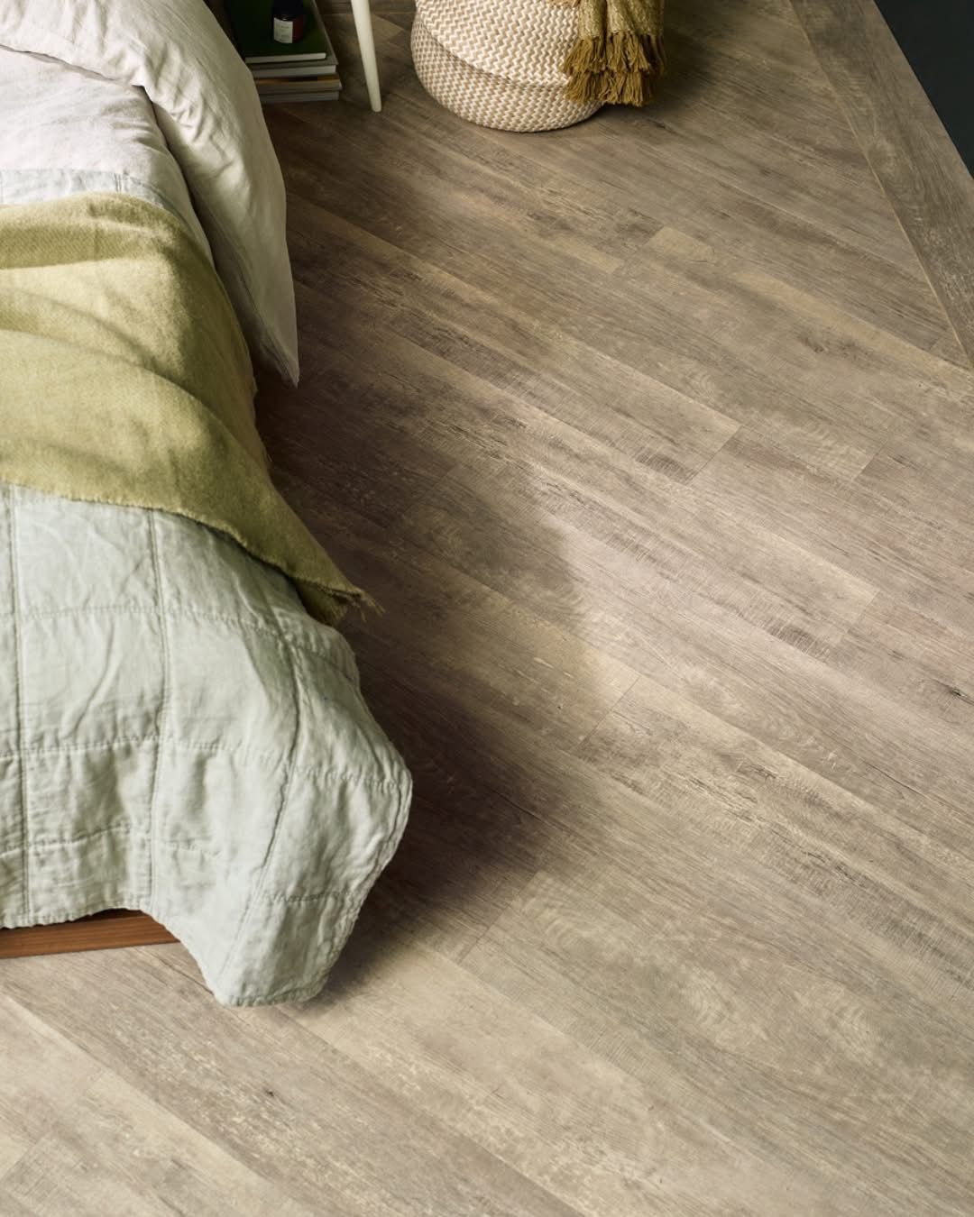A Kitchen with White Cabinets, Wooden Floors and Stools — Kelwin Coastal Carpets In North Brisbane, QLD