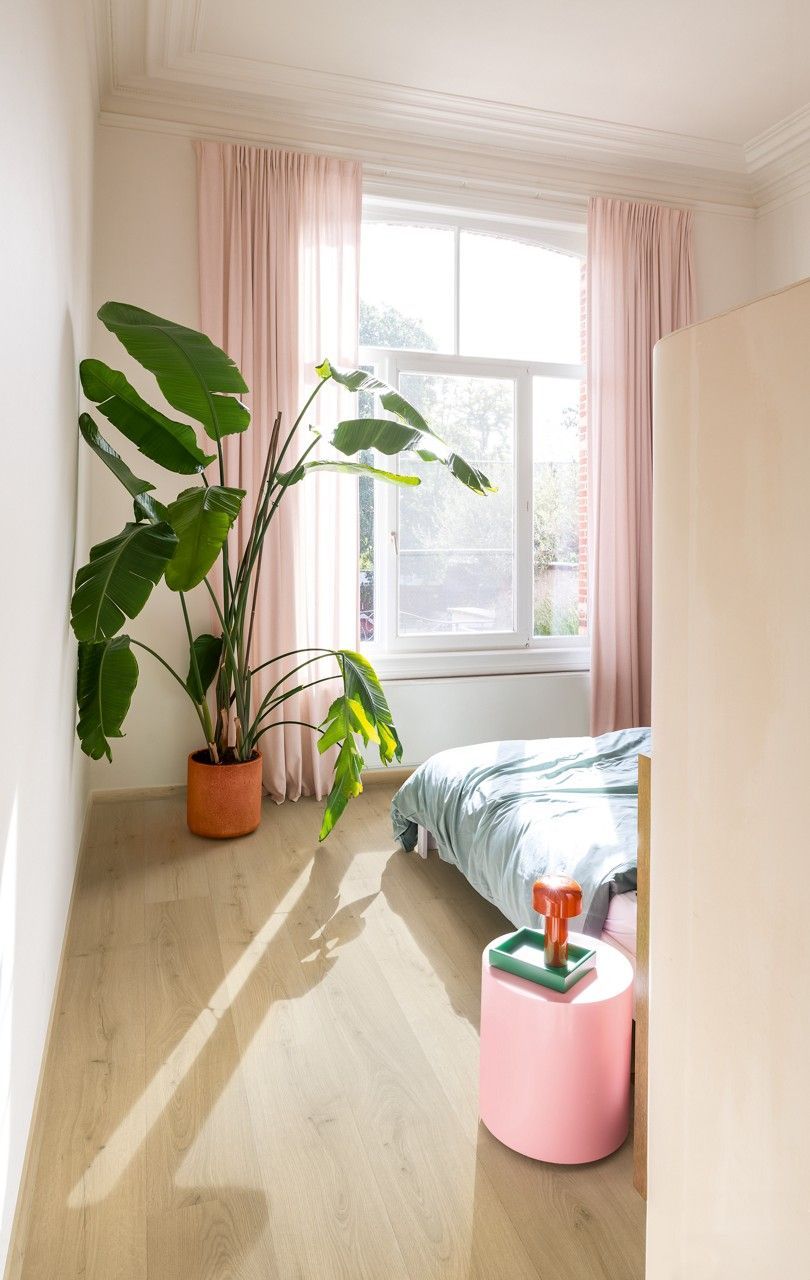 Two Green Chairs Are Sitting Next to A Table in A Living Room — Kelwin Coastal Carpets In Kundra Park, QLD