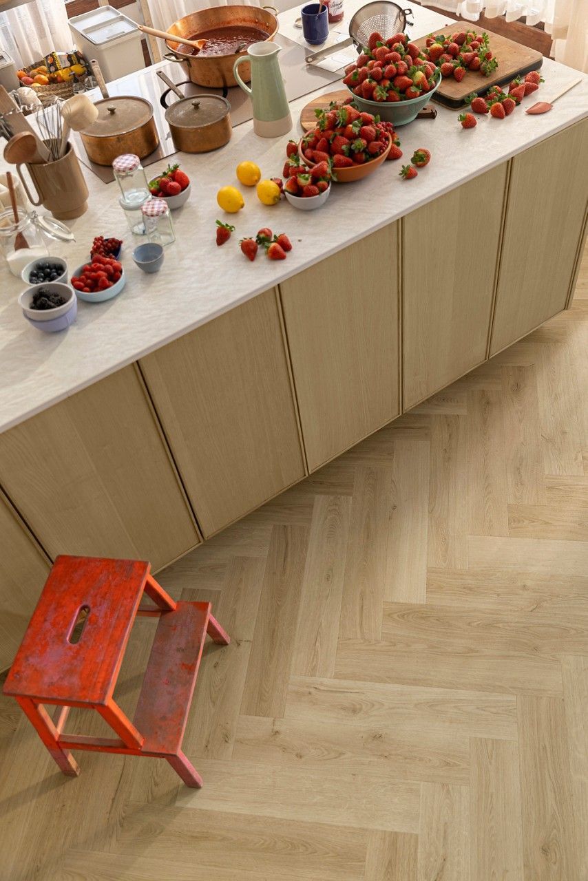 A Living Room with A Chair a Table and A Rug — Kelwin Coastal Carpets In Kundra Park, QLD