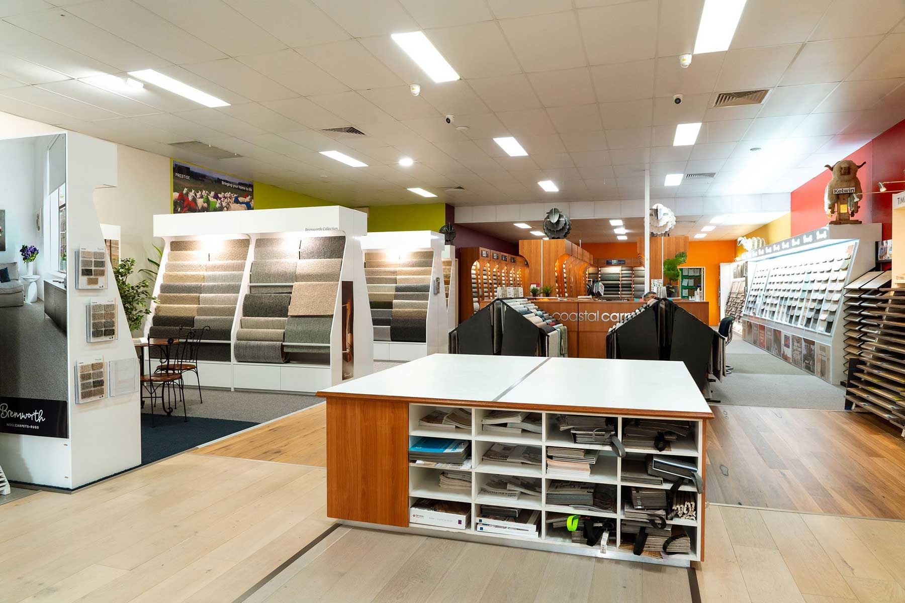 A Large Room with A Table in The Middle of It — Kelwin Coastal Carpets In Kundra Park, QLD