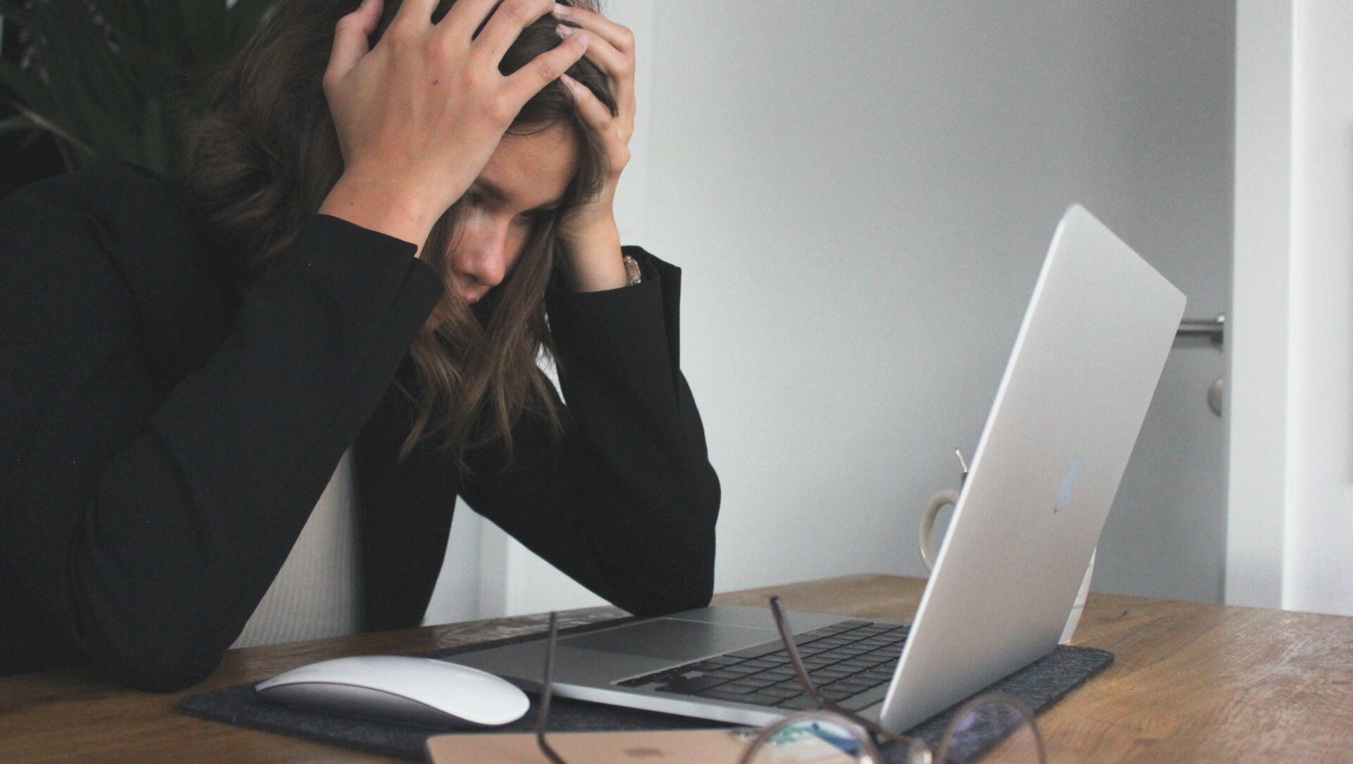 frustrated girl in front of laptop Single Sign-On Authentication