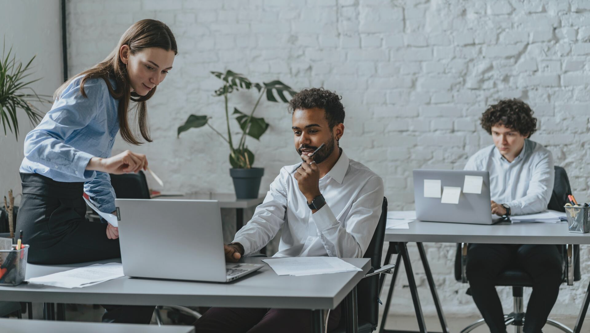 Man and woman talking in office