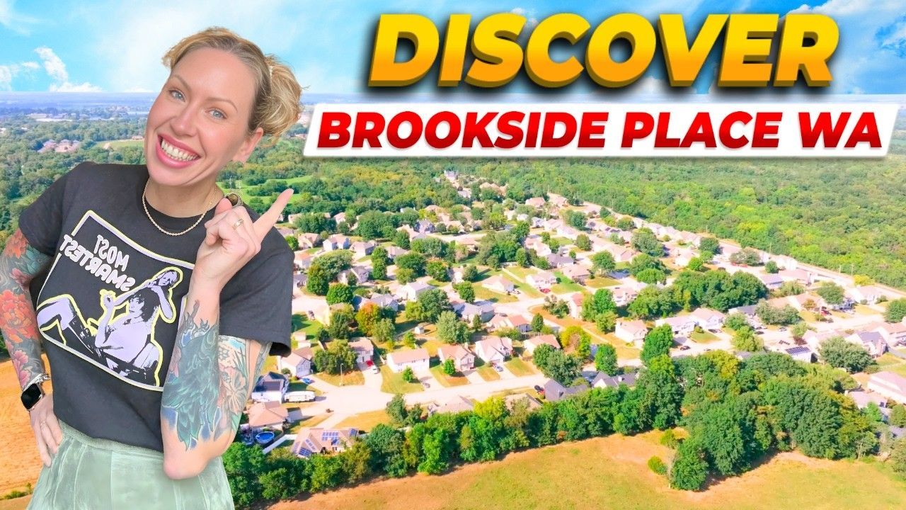 A woman points to an aerial view of the Brookside Place neighborhood, with the title 