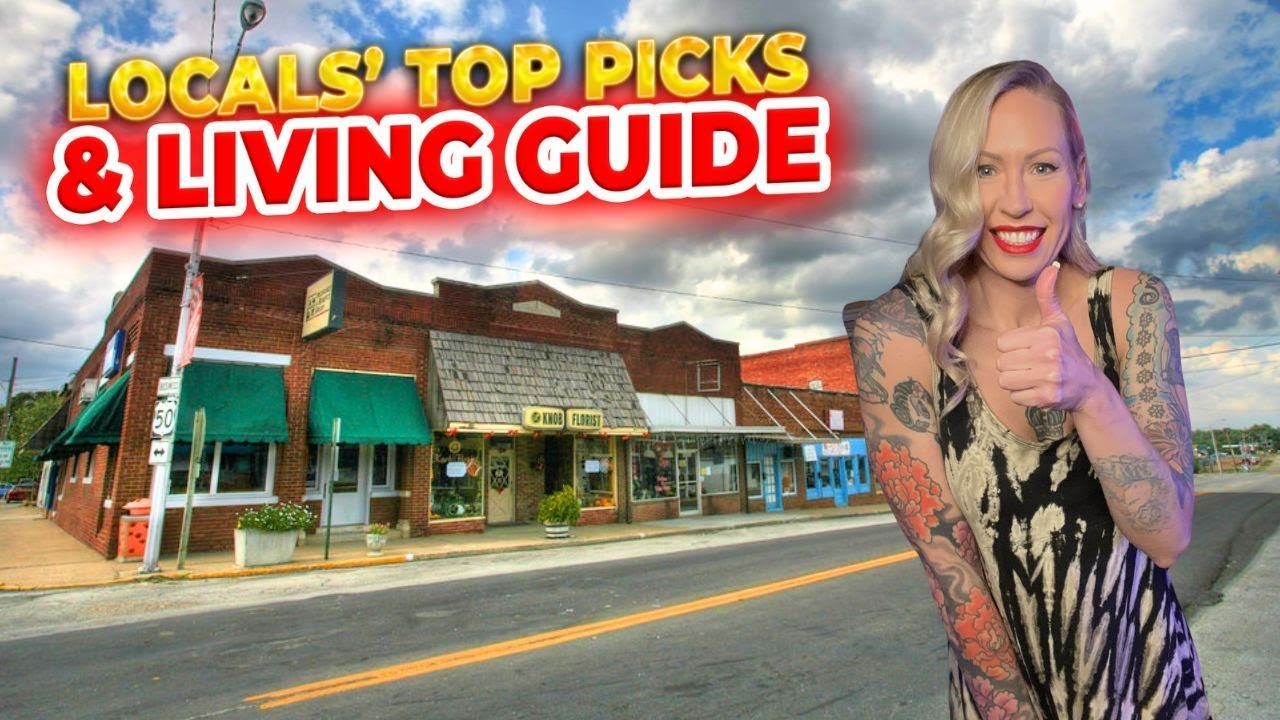 A woman giving a thumbs up in front of a building that says locals top picks & living guide