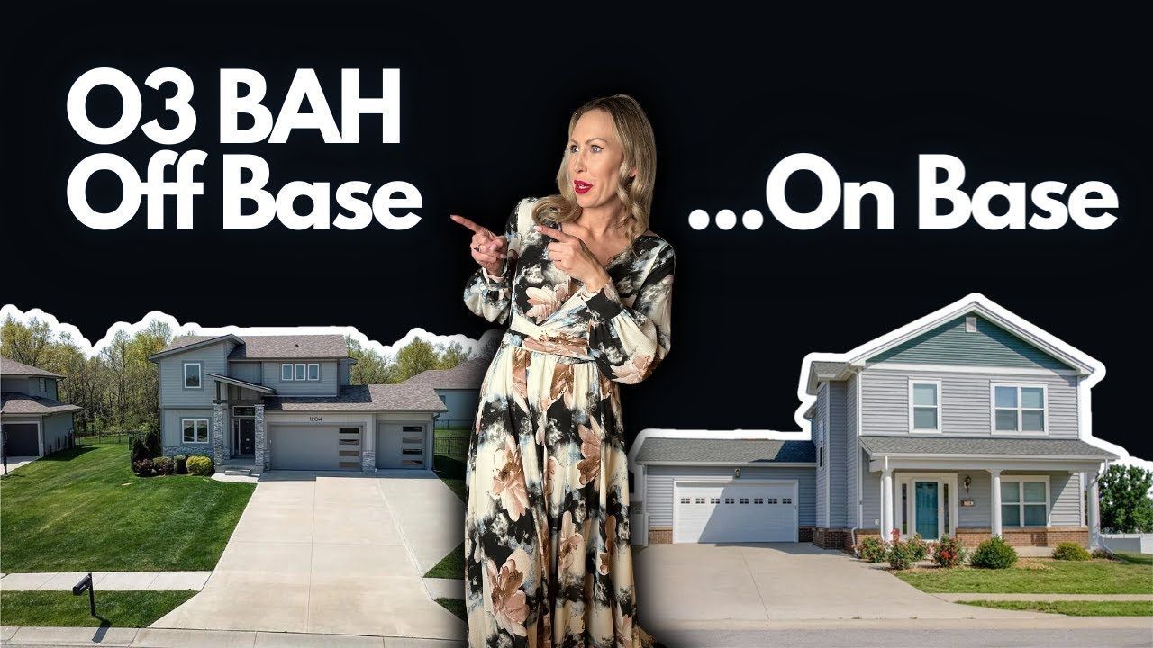 A woman in a floral dress is standing in front of a house.