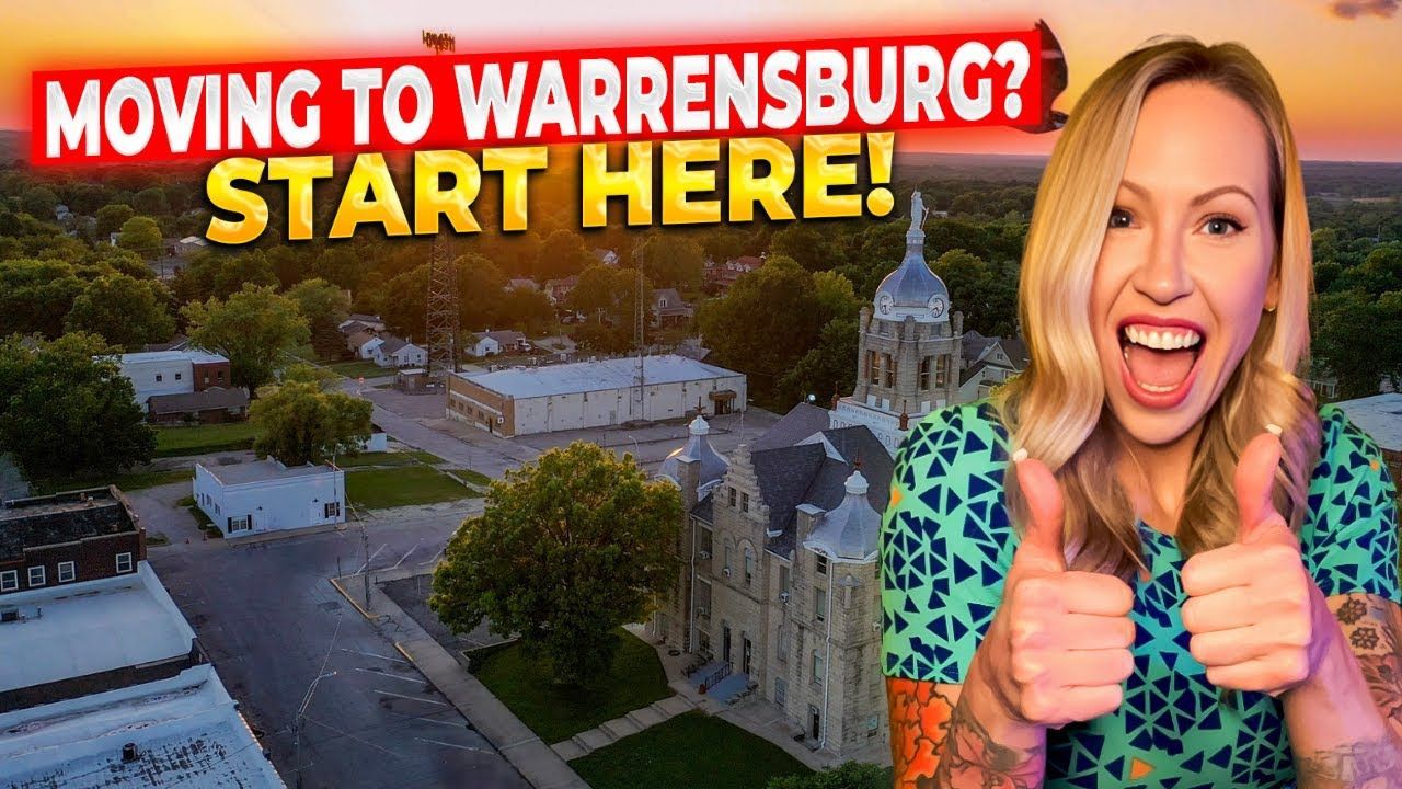 A woman is giving a thumbs up in front of an aerial view of Warrensburg.