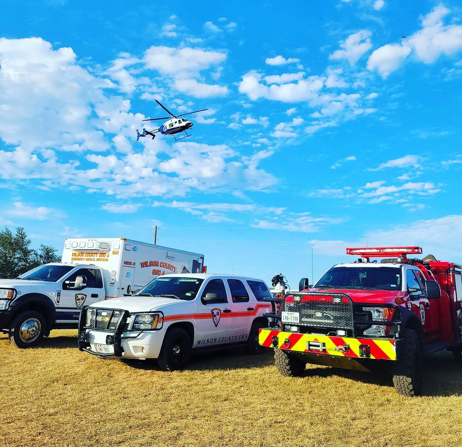 An ambulance is parked in front of the Wilson County Courthouse.