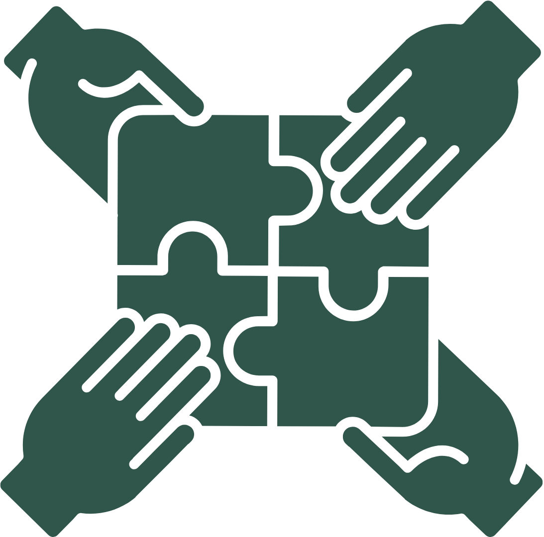 Four hands are holding pieces of a puzzle together.