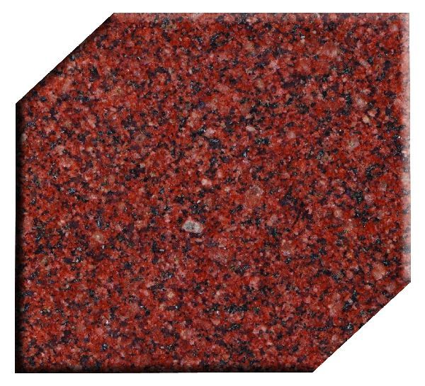 Red granite tile with black and white speckles, cut with angled sides.