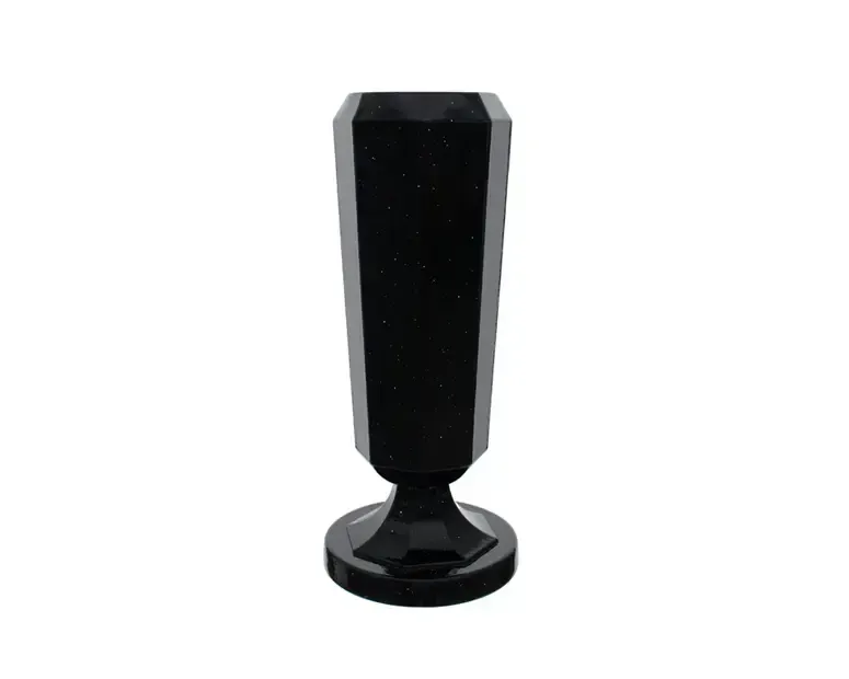 Black faceted vase with a pedestal base.