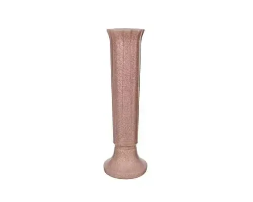 Tall, pink, textured vase with a wide base and a narrow opening.