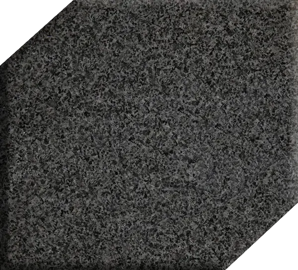 Gray, coarse, textured surface, possibly a filter or pad.