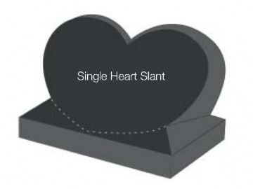 Dark heart-shaped headstone on a rectangular base, labeled 